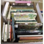 A box of assorted gardening books