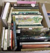 A box of assorted gardening books