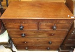 A mahogany chest of two short and three