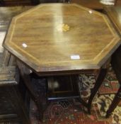 An Edwardian rosewood and inlaid octagon