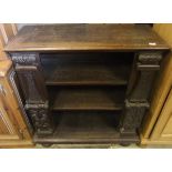 A late 19th / early 20th Century oak Gothic style open three shelf bookcase with applied moulded