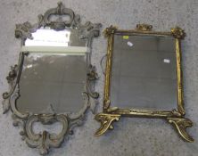 A gilt rectangular wall mirror with flor