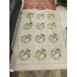 A modern needlework rug, the pale pink g