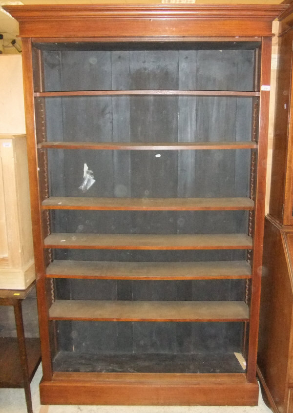 A mahogany veneered seven shelf adjustable open bookcase on simple plinth base CONDITION REPORTS