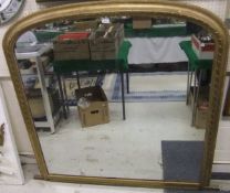 A Victorian gilt framed dome top overman