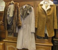 A mink three quarter length coat, bears