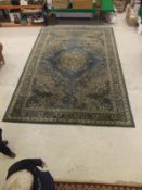 A machine made Persian style carpet in s