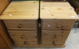 A pair of pine three drawer bedside ches