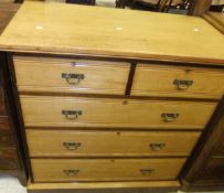 A circa 1900 ash chest of two short and