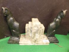 A pair of patinated metal seated cat boo