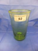 A 19th Century green bubble glass beaker of plain form,