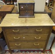 An early 20th Century oak chest of three