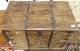 An Indian teak and iron bound trunk with