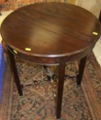 An mahogany occasional table in the Chip
