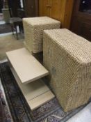 Three wicker cube stools, a large square