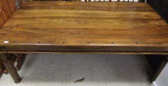 An Oriental hardwood rectangular dining