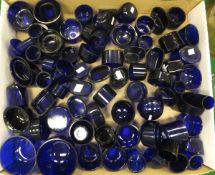 A box of various Bristol Blue glass pot