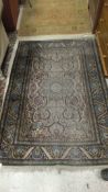 A Persian silk rug, the centre medallion