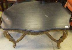A painted and gilded centre table in the
