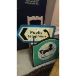 A public telephone road sign, together w