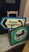 A public telephone road sign, together w