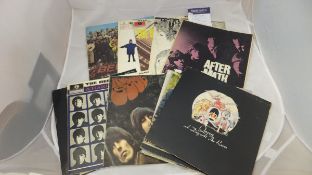 A collection of LP records to include The Rolling Stones "Aftermath", The Beatles "Revolver", The