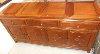 A modern Chinese hardwood sideboard, the