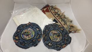 Two vintage Chinese circular embroidered panels, together with a collection of lace-edged pillow