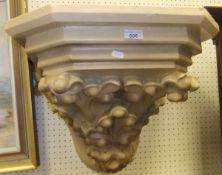 A Victorian carved and painted wall brac