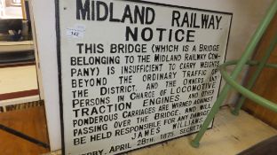 A reproduction cast iron Midland Railway