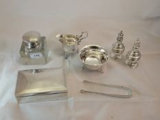 A Victorian silver milk jug and matching sugar bowl with shaped rim raised on three pad feet (