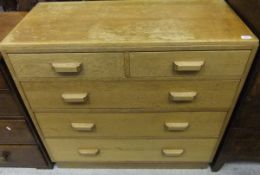 An oak chest of two short and three long graduated drawers on a plinth base CONDITION REPORTS Top is