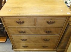 An Edwardian pine chest of two short and