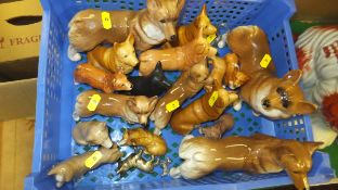 A collection of Corgi dog and other ornaments to include a Beswick figure of a corgi (gloss