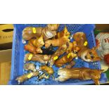 A collection of Corgi dog and other ornaments to include a Beswick figure of a corgi (gloss