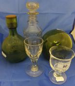 A collection of various stemmed drinking glasses, three decanters and stoppers, three Imperial
