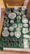 A large collection of Wedgwood green Jas