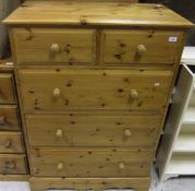 A pine chest of two short over three lon