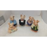 A set of five Wade Nat West piggy banks,