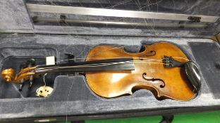 A violin with two piece back, bearing paper label to interior "Jacobus Stainer", together with a P &