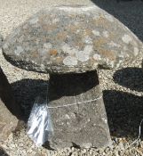 A natural stone staddlestone, the base cut with four facets CONDITION REPORTS Approx 73cm high