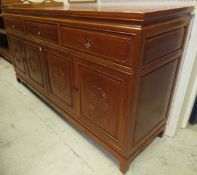 A modern Chinese hardwood sideboard,