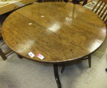 An early 19th Century oak tea table,