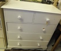 A modern painted pine chest of two short above three long drawers in the Victorian manner