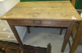 A circa 1900 pine table, the plain top above single drop-leaf and single drawer to side,