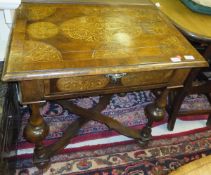 An 18th Century and later walnut and seaweed marquetry inlaid side table, the medallion decorated