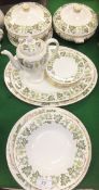 A collection of Wedgwood "Santa Clara" pattern table wares, decorated with fruiting vine,