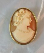 A 14 carat gold mounted oval shell cameo as a lady in pearl necklace