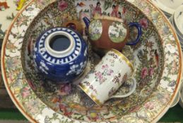 A Chinese famille-rose washbowl, a Samson porcelain armorial mug and an Oriental ginger jar