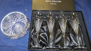 A boxed set of four Royal Doulton wine glasses,